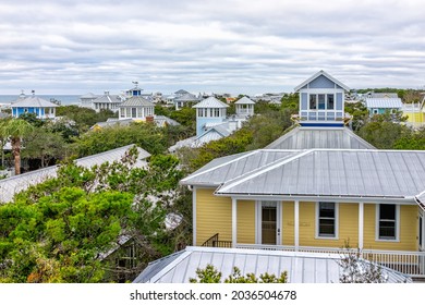 High angle aerial view on Gulf of Mexico sea ocean water in Seaside, Florida and cityscape of terrace buildings houses from balcony in winter