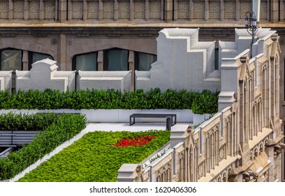 High Angle Aerial View Of A Rooftop Garden On An Ornate Roof Of A Skyscraper In Manhattan New York