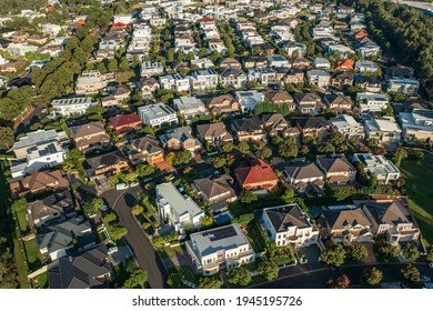 High angle aerial view of an upmarket houses and streets, north west Sydney, Australia.