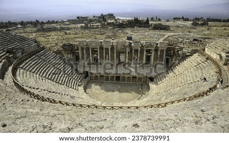 High angle and autumnal view of a amphitheater of Roman era with historic sites at Hierapolis, Türkiye
