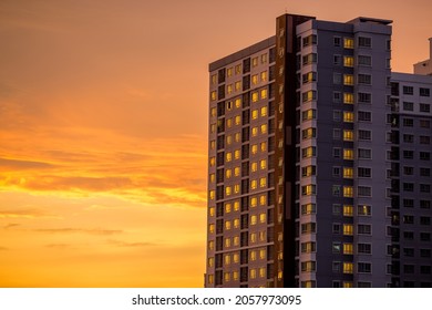 The high angle background of the city view with the secret light of the evening, blurring of night lights, showing the distribution of condominiums, dense homes in the capital community
