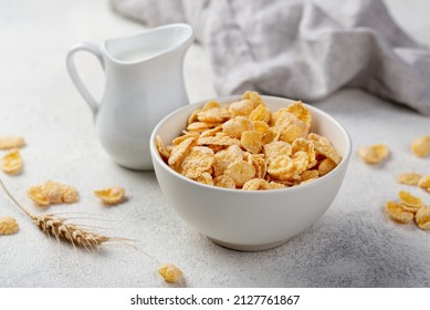 high angle breakfast corn flakes bowl with milk wheat - Powered by Shutterstock