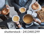 High angle closeup of volunteers hands giving out free food to Middle Eastern refugees at soup kitchen, copy space