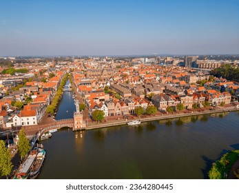 High angle Drone Point of View on Canals in City Center of Alkmaar, North Holland, The Netherlands on summer day in September