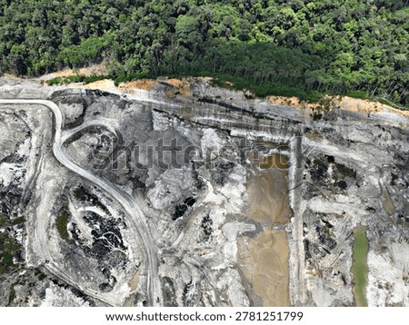 High Angle Drone Shot of Mining Haul Road and Overburden Removal Area in Tropical Forest Border