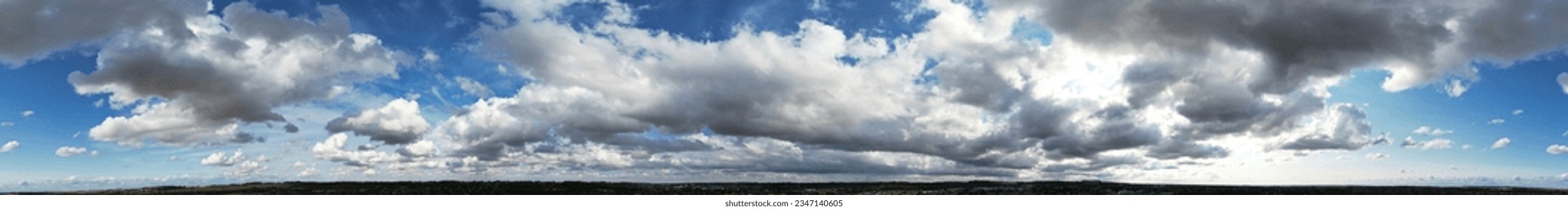 High Angle Drone's Camera Panoramic View of Dramatic Clouds and Sky over the Luton City of England UK, August 4th, 2023 - Powered by Shutterstock