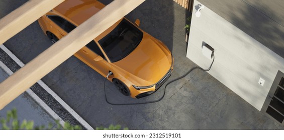 High angle Generic electric vehicle EV hybrid car is being charged from a wallbox on a contemporary modern residential building house - Shutterstock ID 2312519101