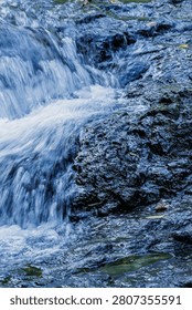 High angle perspective of pristine river water navigating through a rocky terrain. Perfect for geography projects, travel guides, and nature lovers.