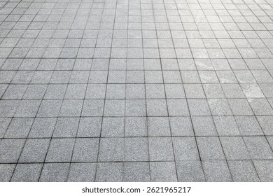 High angle perspective view background of empty grey square floor tiles pavement showing pattern texture.