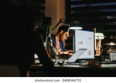 High Angle Photo of Business People Analyzing Statistics and Discussing Marketing Strategy in the Office. - Powered by Shutterstock