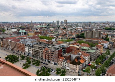 A high angle shot of the docks on Scheldt river and the historical buildings of Antwerp in Belgium