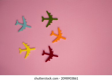 High Angle View Of Airplane Objects Against Pink Background