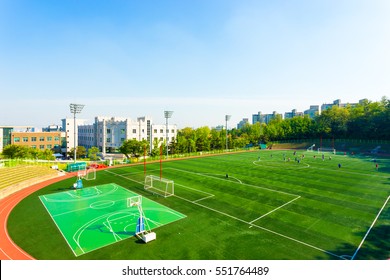 High angle view of artificial turf on the athletic soccer field at the track stadium on the campus of Korea University in Seoul, South Korea. Horizontal