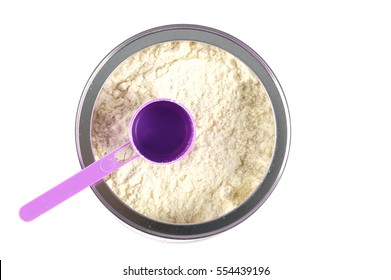 High Angle View Of Baby Formula And Spoon In Can