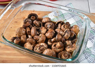 High angle view of a baking dish of mushrooms baked in a soy sauce.