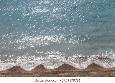 A high angle view of beach cusps in Dorset, viewed from the coastal path near Osmington