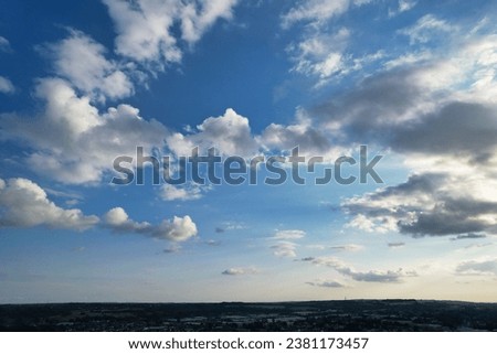 High Angle View of Beautiful and Dramatic Sky with Clouds over Luton city of England UK During Sunset.