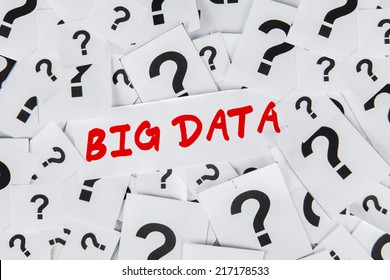 High angle view of a Big Data word and question sign printouts