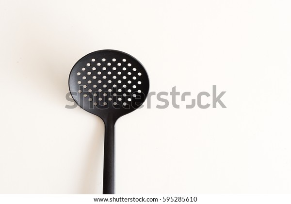 round spatula with holes