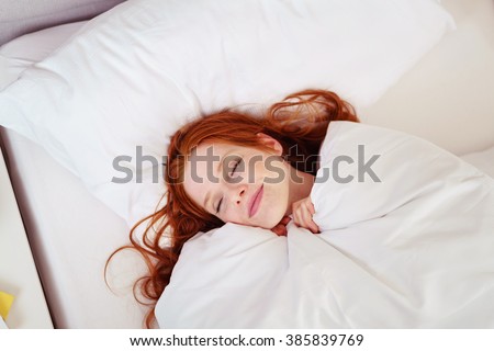 Similar – Image, Stock Photo Snuggled up in bed: long, brown hair covers the sleeping face.