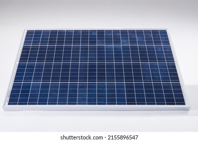 High Angle View Of Blue Solar Panel With Grid Patterns Isolated Over White Background, Copy Space. Solar Energy, Electricity, Green Technology And Sustainability Concept.