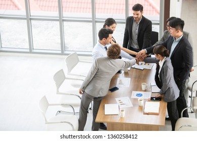 High Angle View Of Business Team Meeting At Modern Office. Directly Above View Of  Marketing Team. Team Work Concept