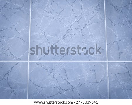 High angle view of ceramic tiles with blue stone pattern for interior design. (Fokus pada desain interior)