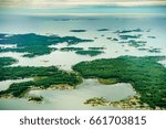 High angle view of coastline with trees and offshore rocks, Toronto, Ontario, Canada. aerial picture from ontario canada 2016