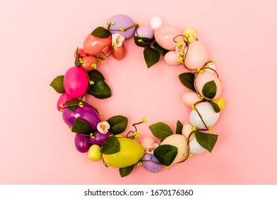 High Angle View Of Colorful Easter Wreath On Pink Background