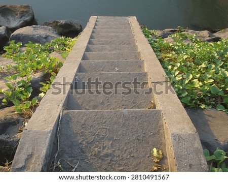 High angle view of concrete and stone stairs outdoors leading downwards