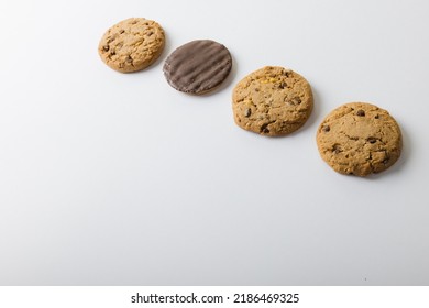 High Angle View Of Cookies Arranged On White Background, Copy Space. Unaltered, Food, Studio Shot.