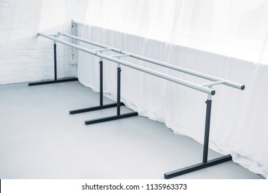 High Angle View Of Dancing Barre In Empty Ballet Studio