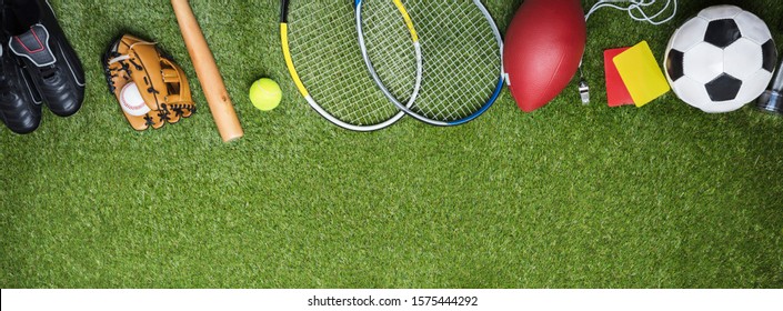 High Angle View Of Different Sports Balls And Equipment Fake Green Turf Grass Backdrop