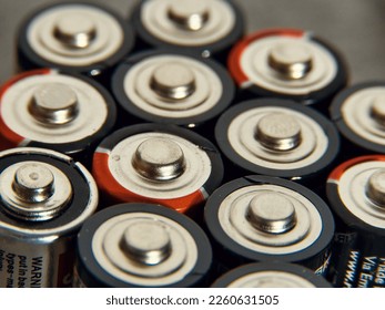 High angle view of different types of used batteries
