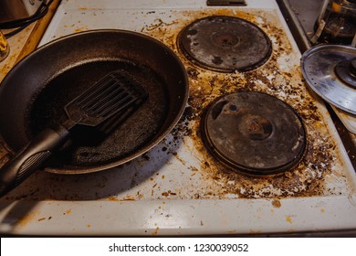 High Angle View Of Dirty Stove Top