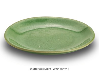 High angle view of empty green shallow ceramic plate isolated on white background with clipping path.