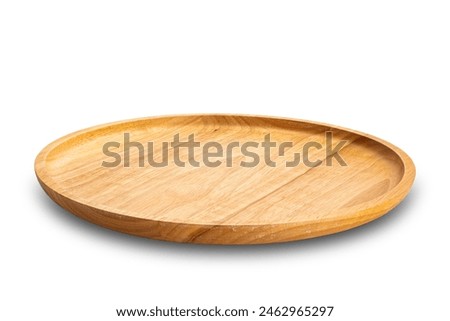 High angle view of empty round wooden plate isolated on white background with clipping path..