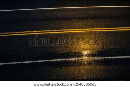 High angle view of a empty wet road after rain.