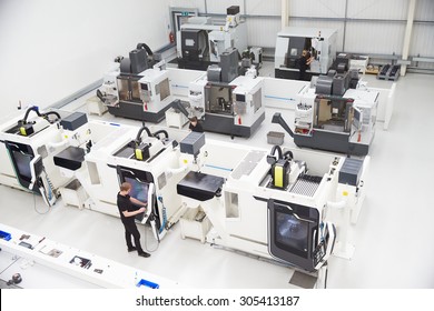 High Angle View Of Engineering Workshop With CNC Machines