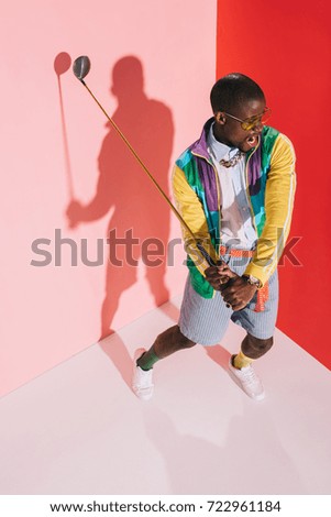 Similar – Black young man listening to music in a sunny day