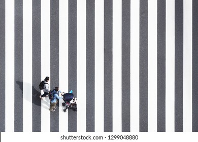 High Angle View Of  Family On Road Section