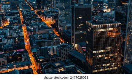 High angle view of Frankfurt main, Germany at night with illuminated streets and skyscrapers. - Powered by Shutterstock