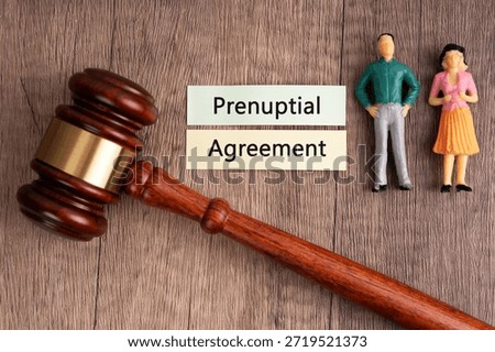 High angle view of gavel and text prenuptial agreement