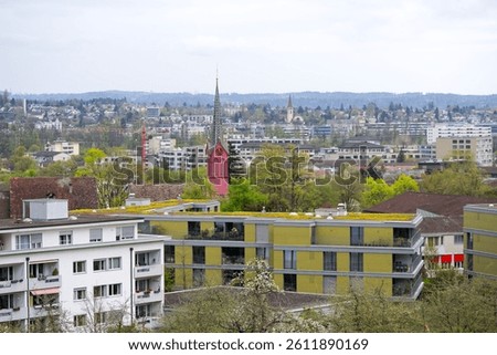 High angle view Glatt Valley with cityscape of Swiss City of Zürich with on a cloudy spring noon. Photo taken April 13th, 2025, Zurich Schwamendingen, Switzerland.