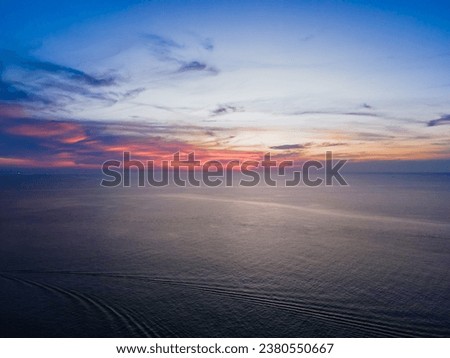 High angle view of Kata beach, Phuket island, Thailand, white sandy beach in summer in the south of Thailand. This famous beach is perfect for relaxing and sunbathing.