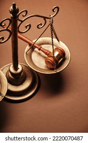 high angle view of libra scale and gavel