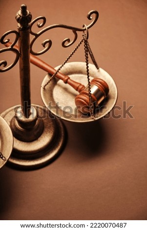 high angle view of libra scale and gavel