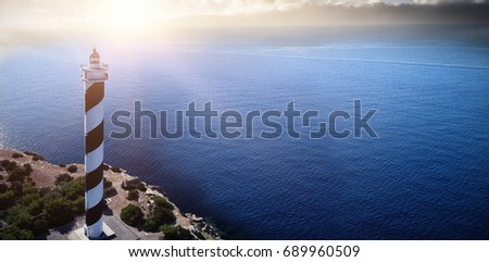 High angle view of a lighthouse on the coastline 