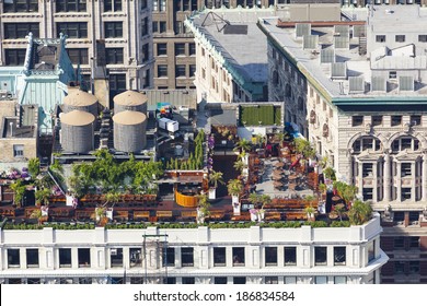 High angle view to lots of gardening on an apartment building roof in Manhattan