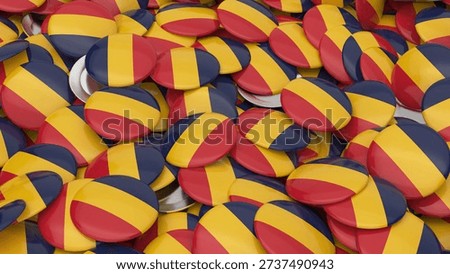 A high angle view of many circular pins showing the Chadian national flag colors in a messy pile
